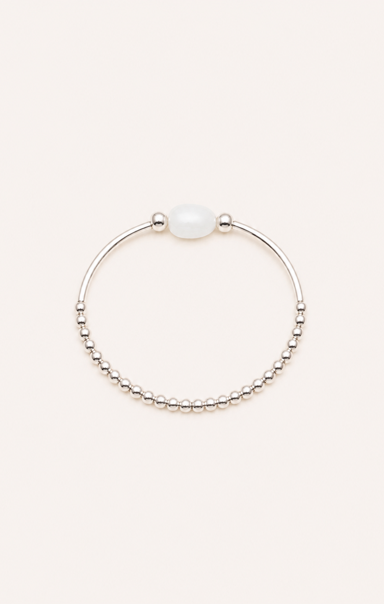 silver bracelet on neutral background