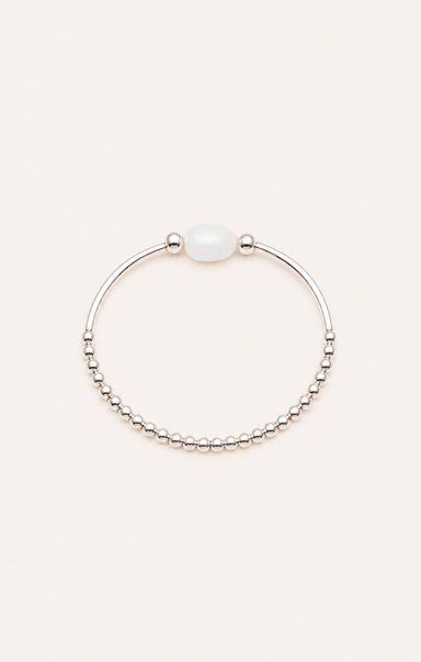 silver bracelet on neutral background