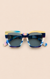 Sunglasses with a colorful frame on a beige background