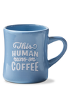 Blue mug with 'This human runs on coffee' text on a white background