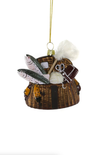 Decorative ornament resembling a wicker basket with fishing elements on a white background