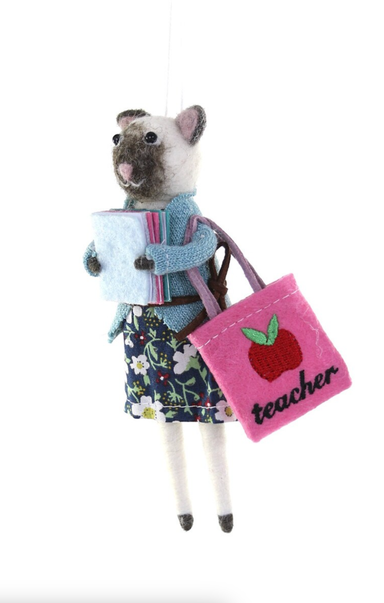 Stuffed animal wearing a teacher outfit with a pink bag labeled 'teacher' on a white background