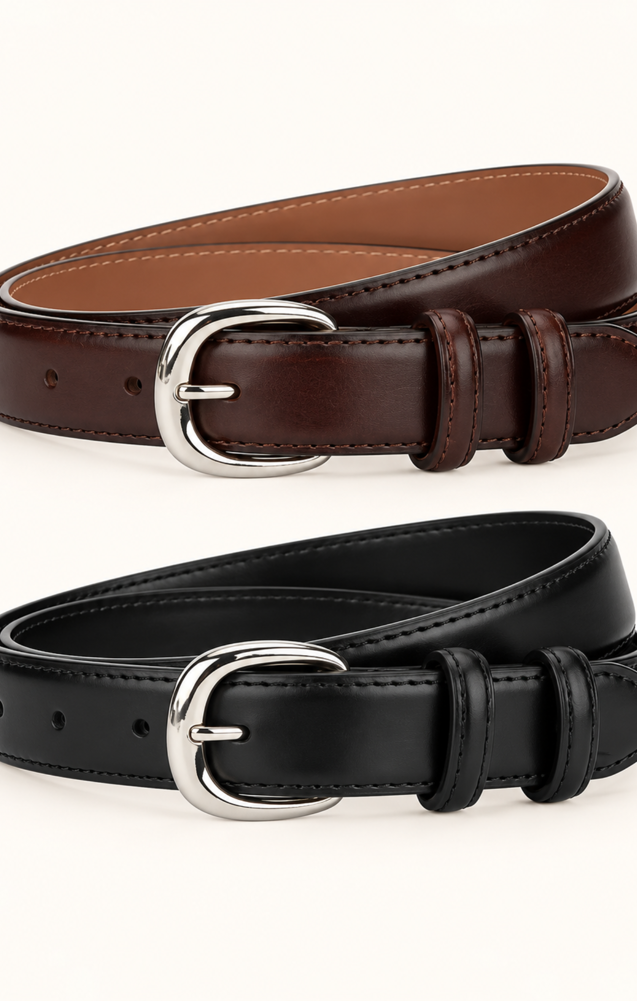 Two leather belts, one dark brown and one black, each with a polished silver-tone metal buckle, arranged on a clean off-white background.