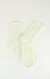 Pair of cream-colored socks on a white background