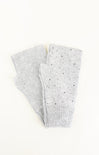 Gray knitted leg warmers with small black dots on a white background