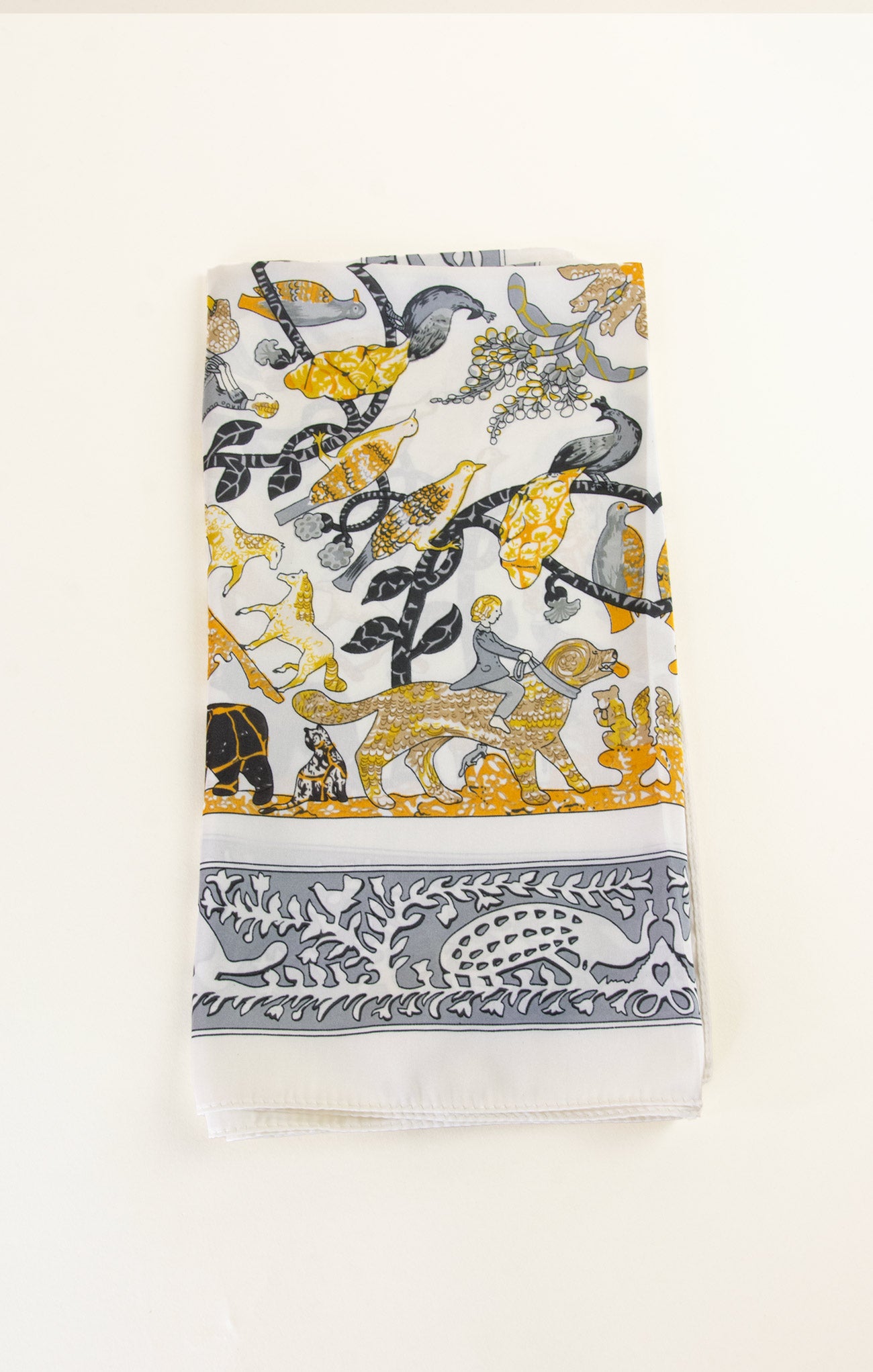 Decorative towel with animal pattern on a white background