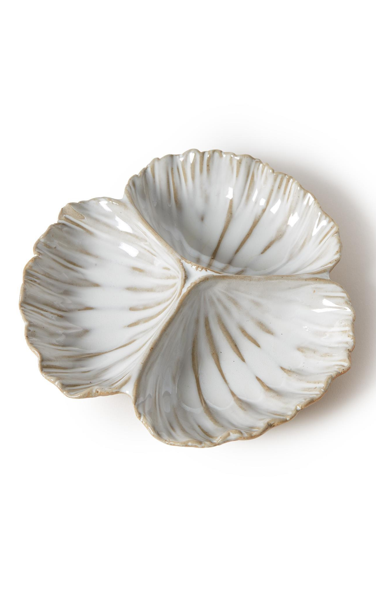 Decorative white shell-shaped dish with gold accents on a white background