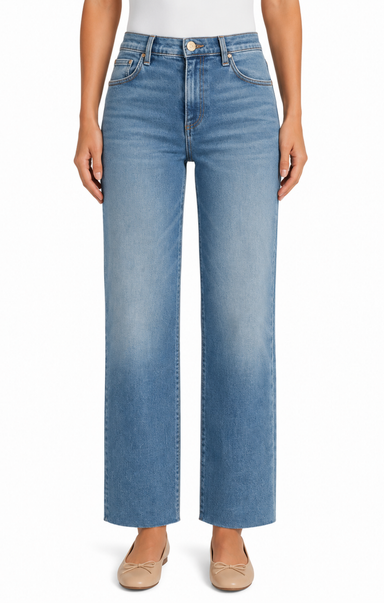 Light blue jeans worn by a person on a white background