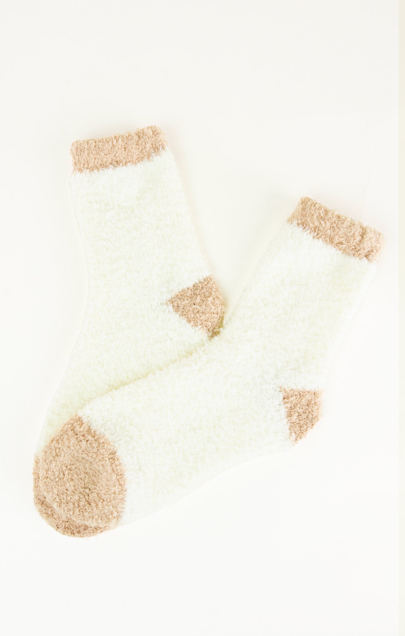 White socks with brown accents on a white background