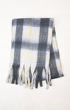 Plaid scarf with tassels on a white background