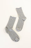 Pair of gray socks with lace trim on a white background