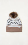 Knitted beanie with a patterned band and fur pom-pom on a white background