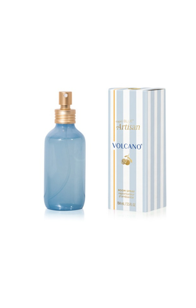 Blue spray bottle and packaging labeled 'Artisan Volcano' on a white background
