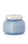 Blue candle jar with striped lid on a white background