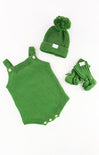 Green baby romper with matching hat and gloves on a white background