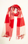Red and white checkered scarf on a mannequin against a white background
