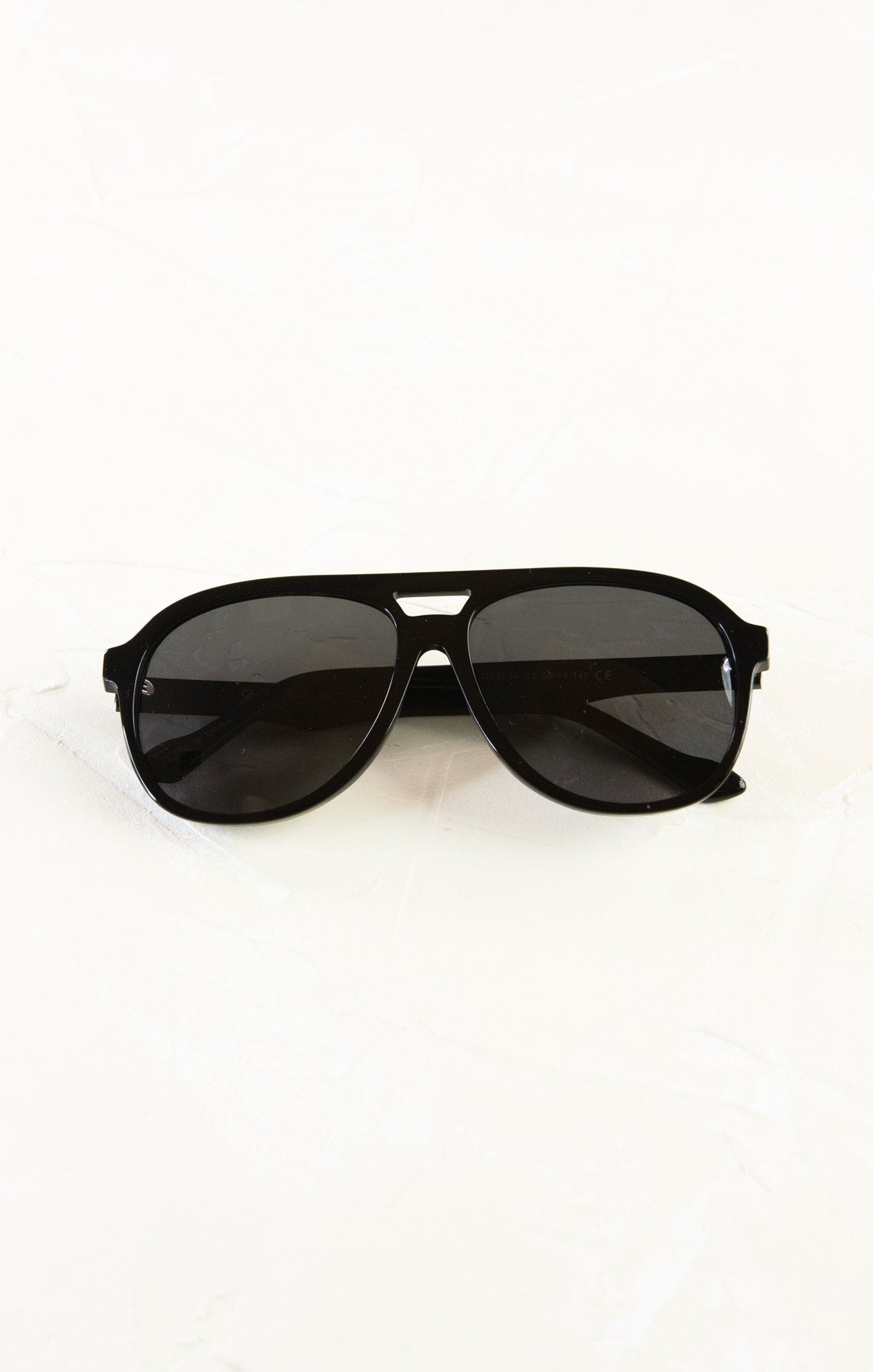 Black sunglasses on a white background