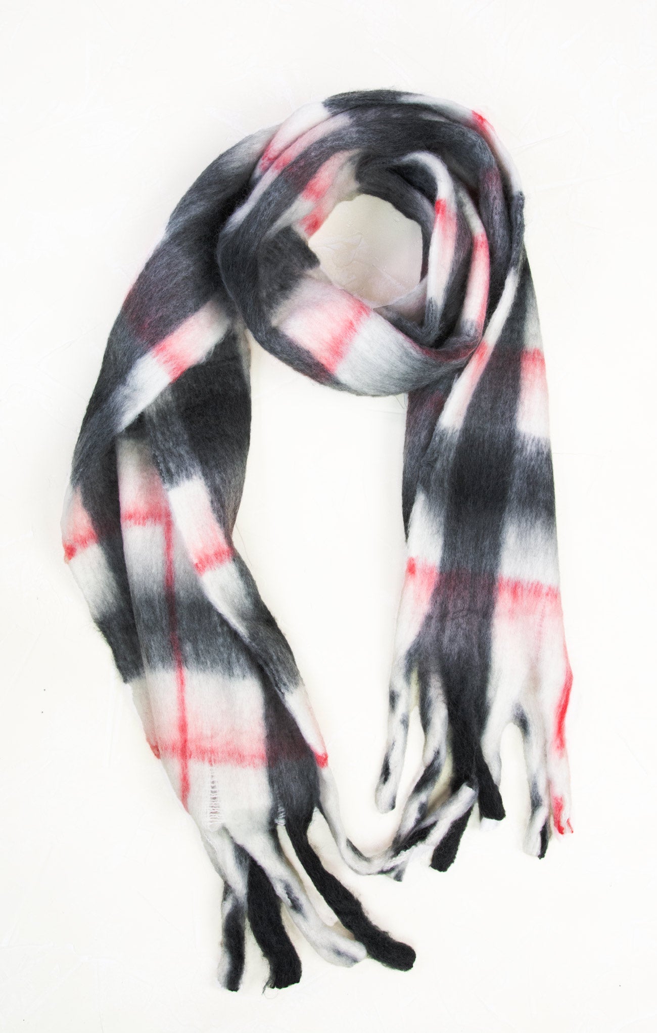 Plaid scarf with black, white, and red pattern on a white background