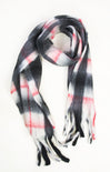 Plaid scarf with black, white, and red pattern on a white background