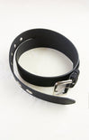 Black leather collar with metal buckle on a white background