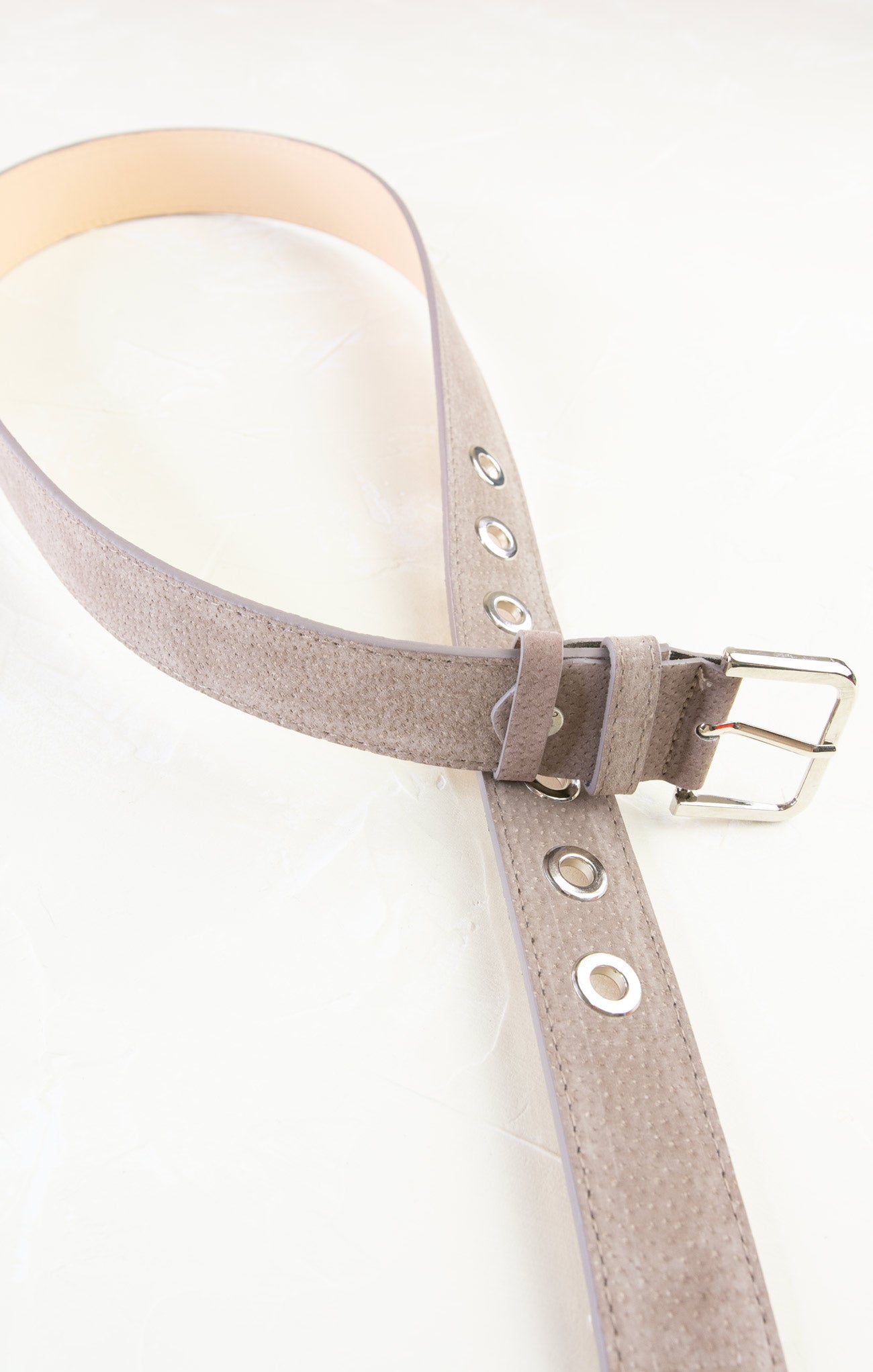 Gray belt with silver buckle on a white background