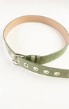 Green belt with silver studs on a white background