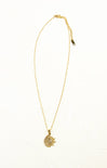 Gold necklace with a pendant on a white background
