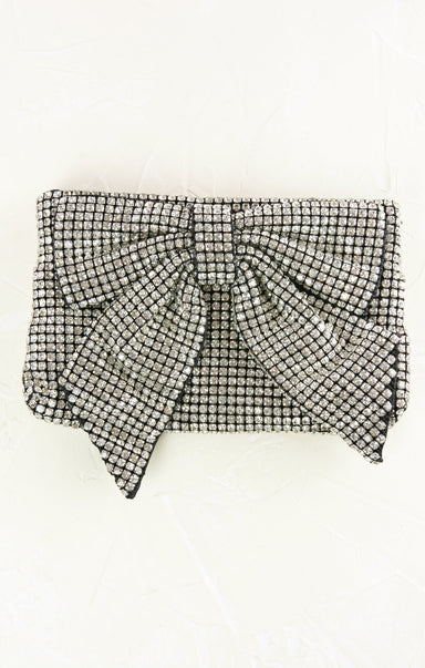 Black and white checkered clutch bag on a white background