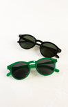 Two pairs of sunglasses, one green and one black, on a white background.