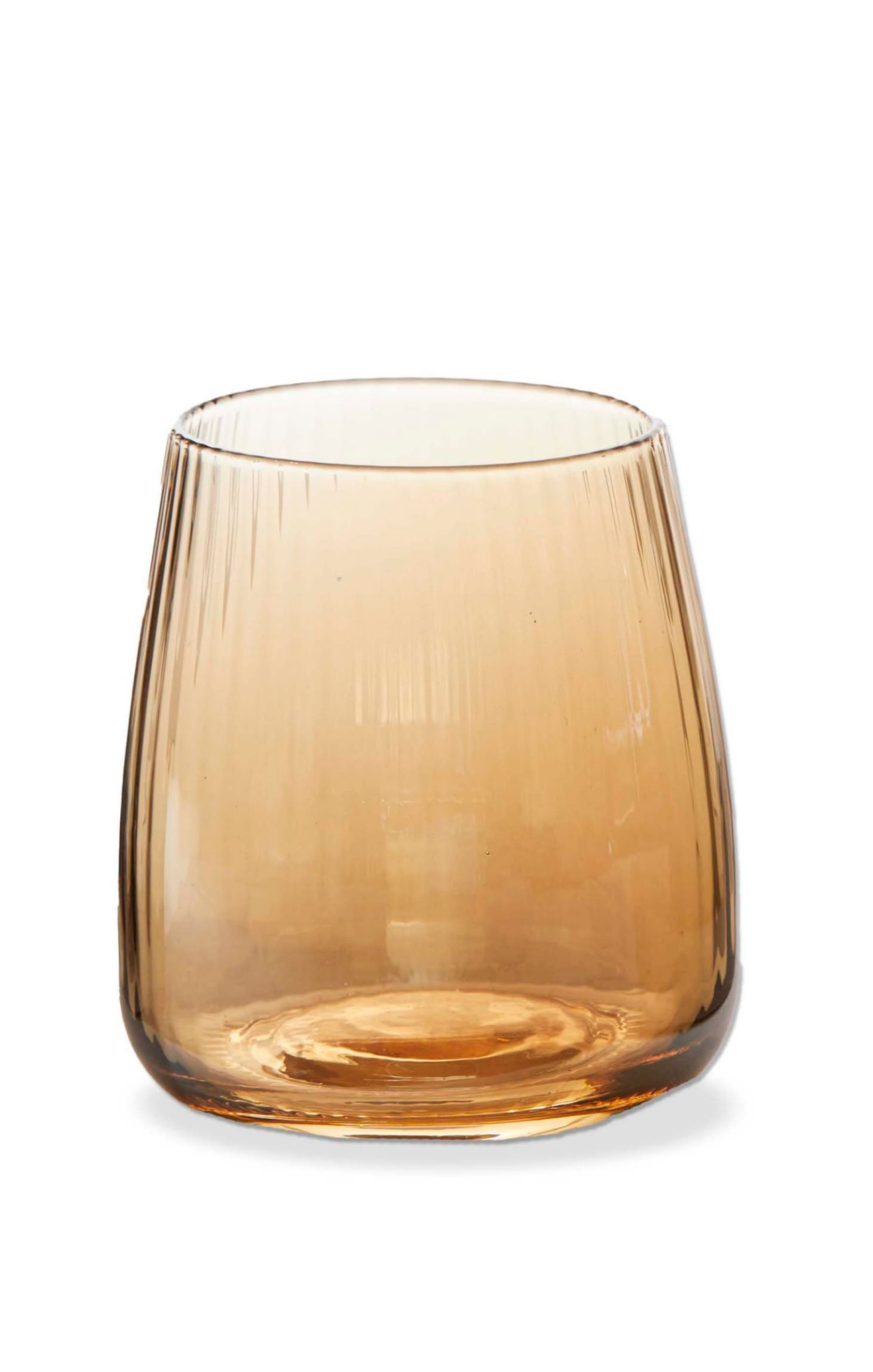 Amber glass tumbler on a white background