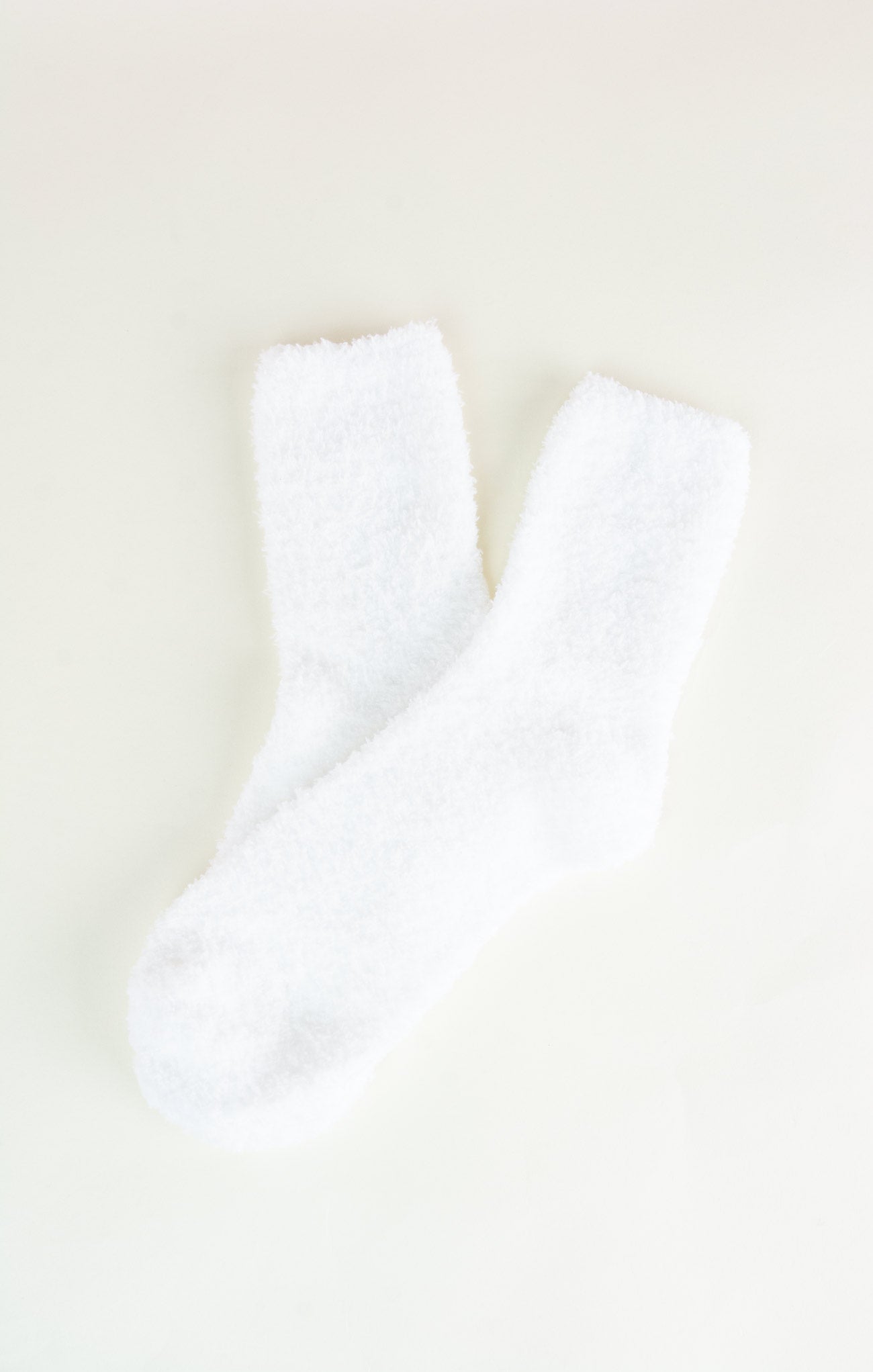 White socks on a beige background