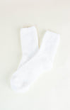 White socks on a beige background