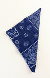 Blue bandana with white patterns on a white background