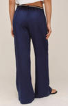 Navy blue wide-leg pants worn by a person on a plain background