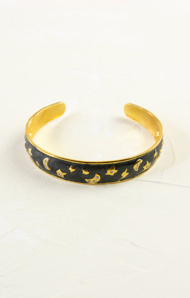 black and gold bangle with gold stars and moons