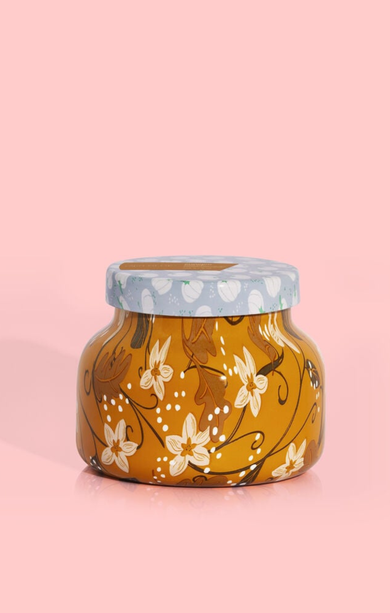 Jar with floral design on a pink background