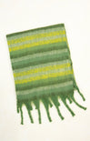 Green and yellow striped scarf with fringes on a white background