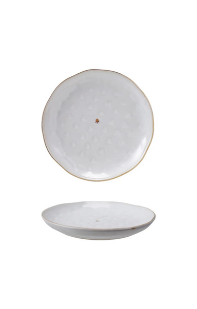 Set of two ceramic plates with textured surface on a white background