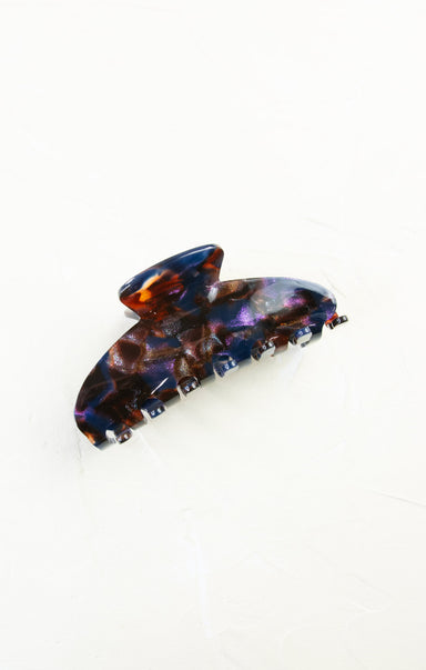 Multicolored hair clip on a white background