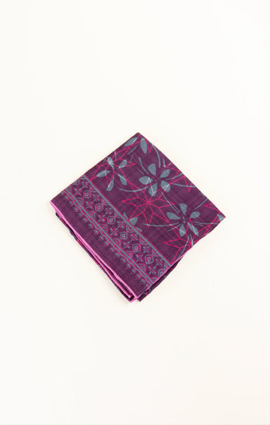 Purple patterned fabric on a white background