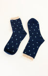 navy floral sock with light blue flowers and tan border