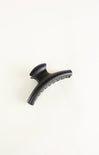 Black hair clip on a white background