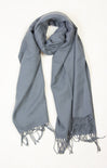 Gray scarf with tassels on a white background
