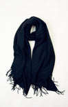 Black scarf with fringes on a white background