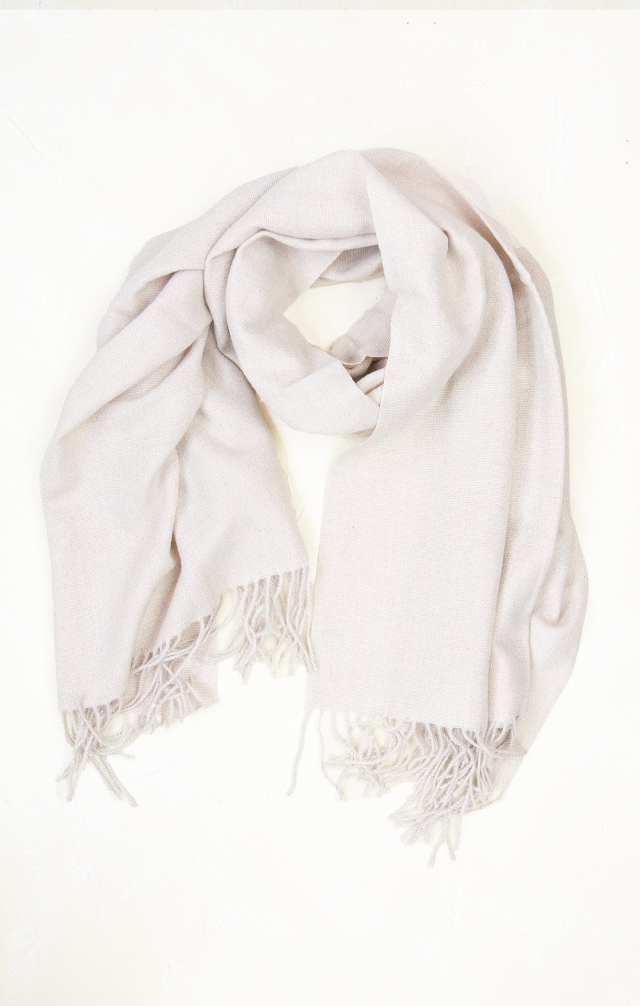 White scarf with fringes on a white background