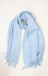Light blue scarf with fringes on a white background