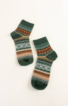 Pair of green socks with pattern on a white background