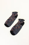Pair of dark gray socks with floral patterns on a white background