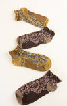 Two pairs of floral-patterned socks in brown and yellow on a white background