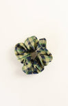 Plaid patterned scrunchie on a white background